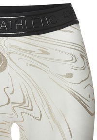 Hochtaillierte Sportleggings in Creme mit einem glänzenden goldenen Marmor Muster, ausgestattet mit einem strukturierten schwarzen Elastikbund, der mit "ATHLETIC" geprägt ist.