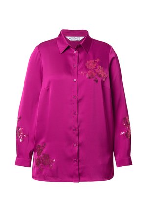 Fuksian värinen silkkinen nappikauluspaita, jossa on pitkät hihat. Etu- ja hihaosissa on kukkakirjontaa kontrastiväreillä.