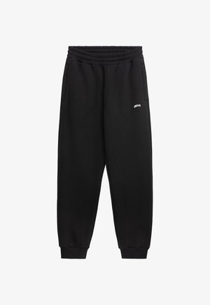 Schwarze Jogginghose mit elastischem Bund, Seitentaschen, gerippten Bündchen und einem kleinen weißen Logo auf dem linken Oberschenkel. Weicher Stoff.