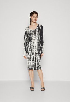 Long-sleeve dress in black and white tie-dye pattern, fitted design, scoop neckline, mid-calf length, fabric appears smooth and stretchy.