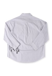 Striped long-sleeve shirt in light gray and white cotton with a curved hem and black graphic detailing on the left sleeve.