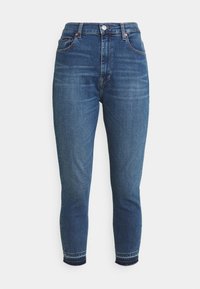 Modré džíny s vysokým pasem, slim fit, pět kapes a mírným vyblednutím. Lem je lehce zničený.