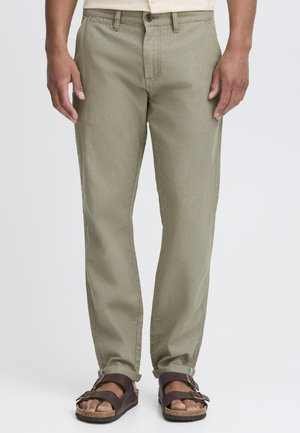 Light olive green trousers with a straight-leg cut, made from a soft, textured fabric, featuring a front button closure and belt loops.