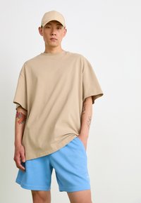 adidas Originals Tracksuit bottoms - light blue