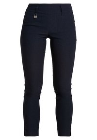 Mörk marinblå slim-fit byxor med en liten metalldetalj på vänster sida, ankellånga med subtila sidoklyftor vid fållen.