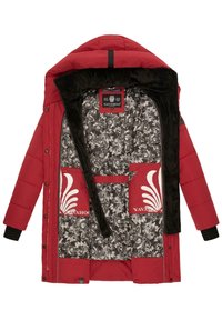 Red padded jacket with a black fur-lined hood, floral patterned interior, two red pockets with white accents, and a branded label.