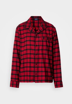 Haut de pyjama à carreaux rouges et noirs, avec un col cranté, une fermeture à boutons et une poche poitrine unique. Confectionné dans un tissu doux avec une coupe décontractée.