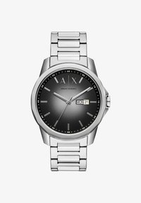 Reloj de acero inoxidable plateado con un dial redondo gris, marcadores de hora plateados y una ventana de fecha que muestra "21". Presenta un diseño de pulsera con eslabones.