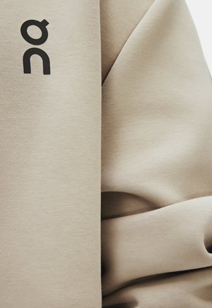 On, FOCUS TECH ZIP HOODIE - Sweat zippé - desert