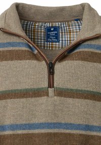 Beige, ribbed Pullover mit Reißverschlusskragen. Verfügt über horizontale Streifen in Braun, Grün und Blau. Gefüttert mit karierter Stoff.