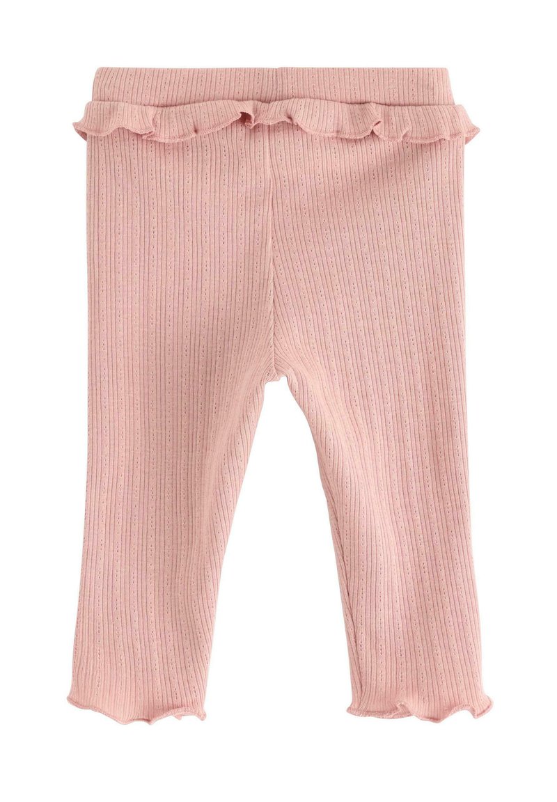 Rosa ribbade leggings med en volangmidja, som har subtila vertikala ränder och en scalloped nederkant vid vristen.
