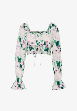 Top court avec de longues manches bouffantes, imprimé floral vert et rose sur fond blanc, présentant un décolleté carré et un détail à cordon sur le devant.