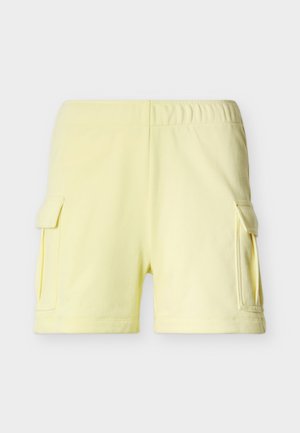 Light yellow elastic waist shorts with side cargo pockets and flap closures, shown on a plain white background.