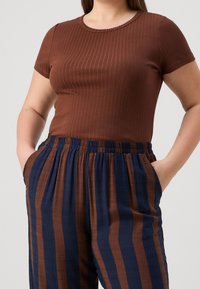 ONLY Carmakoma Tygbyxor - dark blue