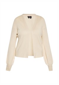 Cardigan a coste color crema con scollatura a V, apertura frontale e maniche a palloncino. Realizzato in morbido materiale con cuciture testurizzate in tutto il capo.