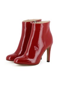 Rote Lackleder-Stiefeletten mit spitzer Zehenform, hohem Stilettoabsatz und Reißverschluss an der Rückseite. Glatte, glänzende Oberflächenbeschaffenheit.