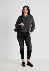 ONLY Carmakoma CARANITA SHIRT - Blouse - black/white