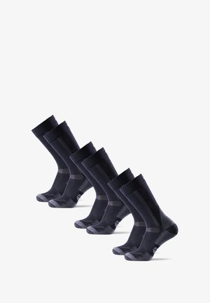 Calcetines azul oscuro con puños acanalados, punteras reforzadas y patrones texturizados. Cuatro pares idénticos dispuestos en fila, mostrando un diseño consistente.