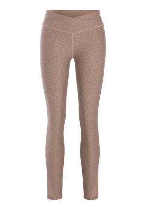 Beige leggings with a subtle leopard print pattern, high-waisted design, and smooth, stretchy fabric for comfort and fit.