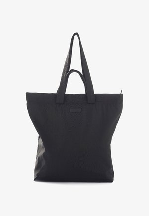 Tote bag noir en nylon texturé, avec deux poignées robustes et un design simple et minimaliste, sans matériel ni embellissements visibles.