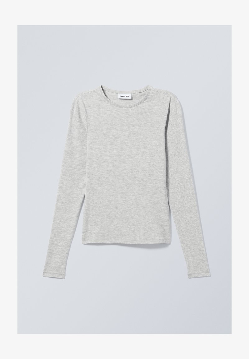 T-shirt à manches longues gris clair, fabriqué en tissu doux et texturé. Doté d'un col rond et d'une coupe décontractée, idéal pour une tenue casual.