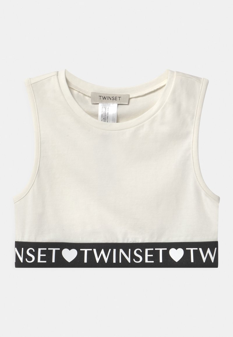 Haut blanc sans manches en coton, avec une bande élastique noire ornée du texte blanc « TWINSET » et d'un motif cœur à l'ourlet.