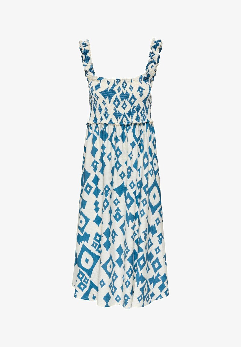 Robe midi blanche sans manches avec motifs géométriques bleus en forme de losange et bretelles à volants sur un corsage smocké.