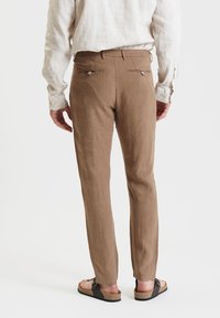 Gianni Lupo Chino - camel