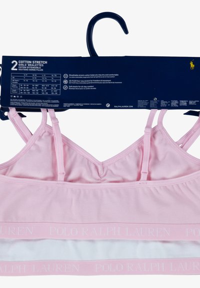Braleti iz bombažne elastike v roza in beli barvi. Imajo nastavljive naramnice, mehak elastičen pas s tekstom "POLO RALPH LAUREN", dihljiv material.