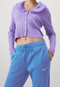 Nike Sportswear Träningsbyxor - blue