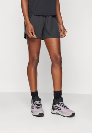 ALPINE - Sports shorts - black