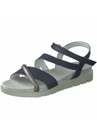 Sandales bleu marine avec des brides synthétiques perforées, accent métallique, semelle intérieure gris coussinée et semelle extérieure en caoutchouc vert clair.
