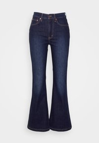 Jeans acampanados de un azul oscuro hechos de denim; cuentan con una cintura alta, cierre frontal de botón y costuras sutiles a lo largo de los bolsillos y las costuras.
