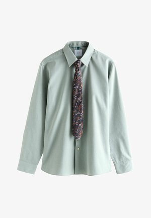 Light green long-sleeve shirt with a textured pattern, buttoned collar, and a dark floral tie featuring shades of blue, red, and pink.