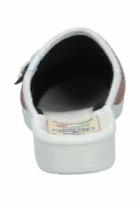 Pink textile slipper with white rubber sole, closed back, plush lining, and label visible inside. Accented with a decorative button detail.