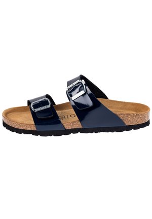 Marineblå sandal i laklæder med to justerbare remme, korksål og en tekstureret sort gummiydersål. Flad model, der er velegnet til afslappet brug.