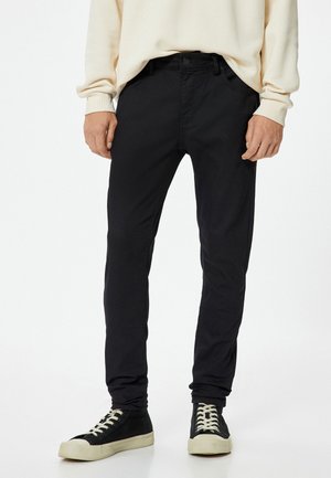Pantalones - black