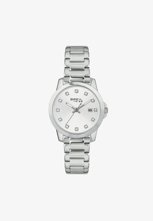 Sølv rustfrit stål ur med en rund urskive, der har en børstet sølv skive, tolv krystal time markører og et datovindue.