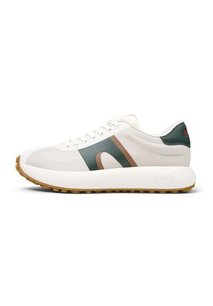 White sneaker with a textured upper, green accents, and brown design stripe. Features a thick, lightweight sole with a patterned tread.
