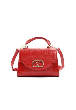 Red glossy handbag with croc texture, top handle, detachable shoulder strap, and gold-tone logo clasp on front flap.