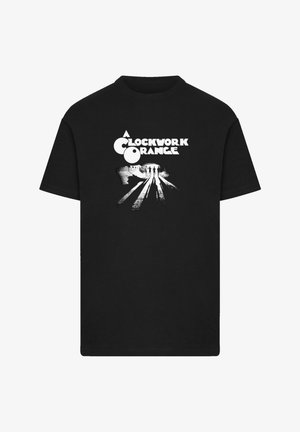 Black cotton t-shirt featuring a graphic print in white, depicting the title "A Clockwork Orange" and silhouettes against a background.