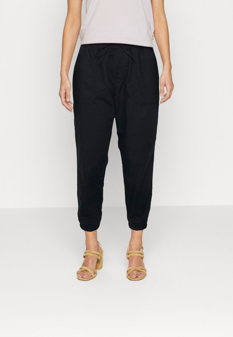 GAP Tracksuit bottoms true black/black Zalando.co.uk