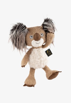 Koala plush toy with brown fur, white belly, large tufted ears, and a smiling face. Features fabric tag at the side. Soft, textured body.