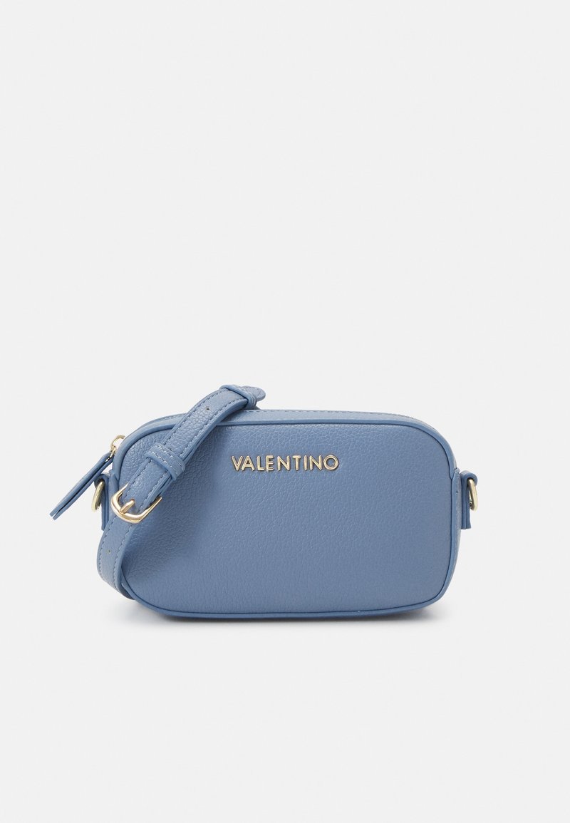 Blue leather crossbody bag with a gold logo and strap. Features a rectangular shape, smooth texture, and zipper closure.