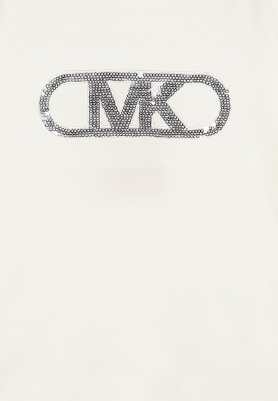 White t-shirt featuring a silver sequined logo "CMK" centered on the front. The fabric appears smooth with a lightweight texture.
