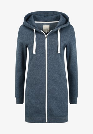 Tume sinine tõmblukuga kapuutsiga jakk, millel on pehme tekstuur, valged nöörid, esikott ja pikk disain, mis ulatub puusani.