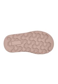 Suela de calzado de color rosa claro con un patrón hexagonal, líneas texturizadas y un parche rectangular cerca del talón.