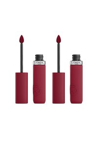 Rouge liquide à lèvres mat et profond avec un applicateur noir. Présente une pointe en mousse pointue et un capuchon slim et texturé pour une bonne prise en main. Marque L'Oréal Paris visible.