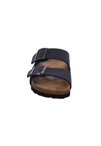 Two-banded navy sandal with adjustable buckles, a cork footbed, and a textured sole. Upper material appears synthetic, smooth finish.