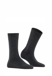 Calze lavorate a maglia di un grigio scuro, con una texture liscia, lunghe fino a metà polpaccio, e con punte e talloni rinforzati, adatte per un look informale.